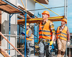 Builders renovating a house