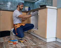 Man fixing a kitchen